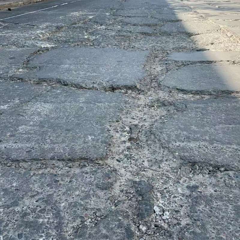 新民路面起砂露石子修补料